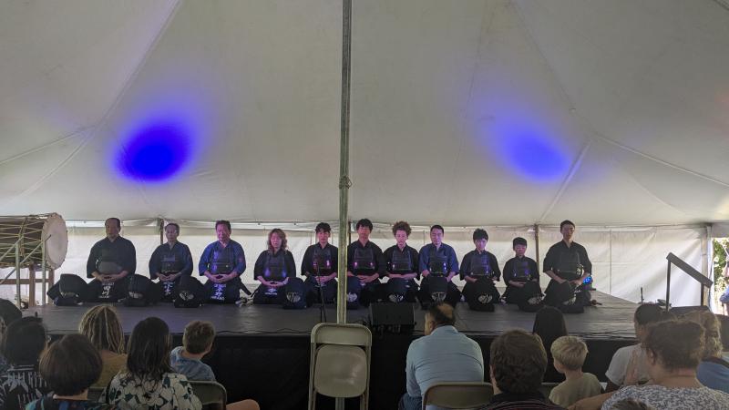 Image of DKD members during meditation at the end of the demo